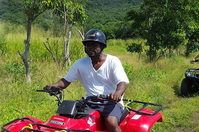 Jungle Bikes ATV Adventure & Beach Tour in St. Kitts - Riding through St. Kitts sugar cane country